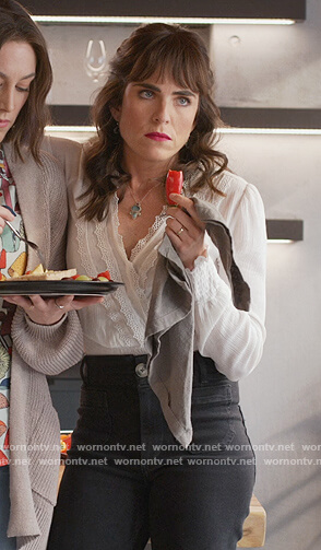 Marina's white lace wrap blouse on Home Economics