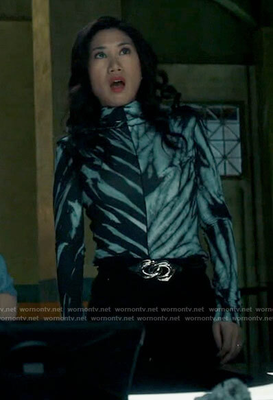 Mel's blue tie dye top on The Equalizer