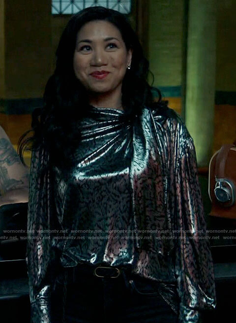 Mel's draped metallic blouse on The Equalizer