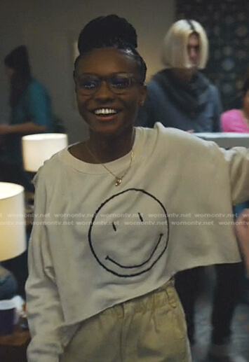 Naomi's white smiley face top on Naomi
