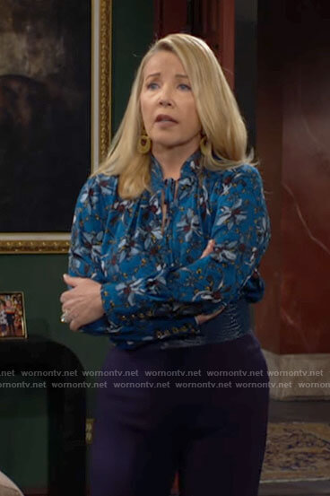 Nikki's blue floral blouse on The Young and the Restless