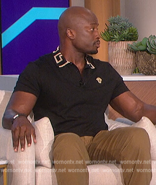 Akbar's black polo on The Talk