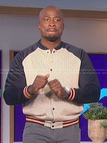 Akbar's plaid stadium jacket on The Talk