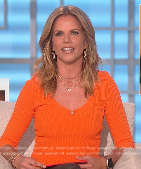 Natalie's orange scoop neck sweater on The Talk