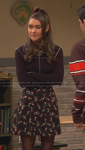 Cami's black top and floral mini skirt on Ravens Home