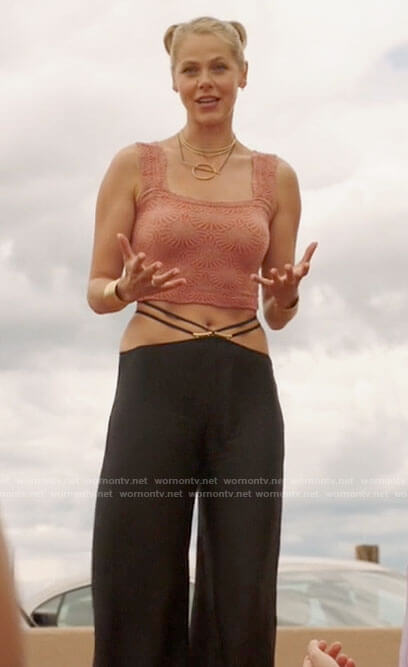 Isobel's pink floral crop top and strappy pants on Roswell New Mexico