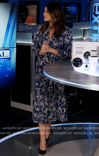 Jennifer's blue floral print dress on Extra