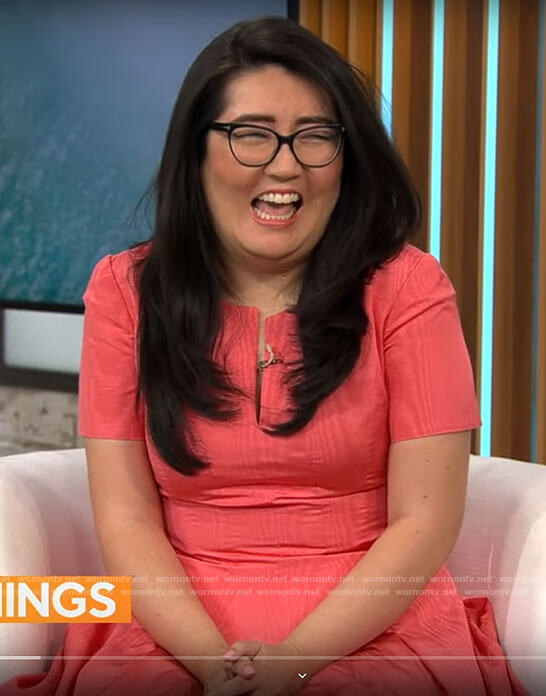 Jenny Han's coral pink split-neck dress on CBS Mornings