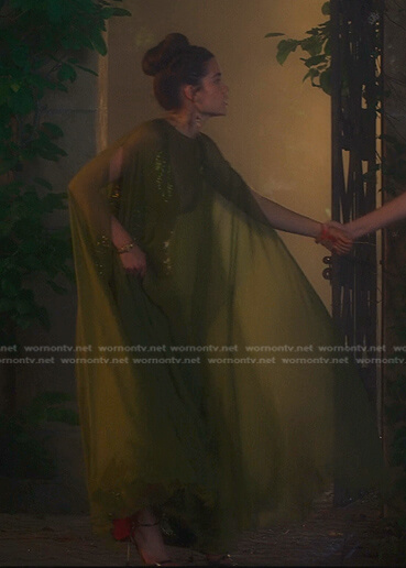 Juliette's yellow sequin cape dress on First Kill