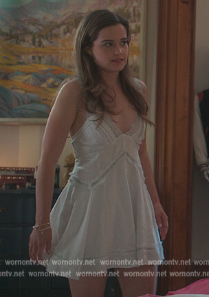 Juliette's whit elace trim mini dress on First Kill