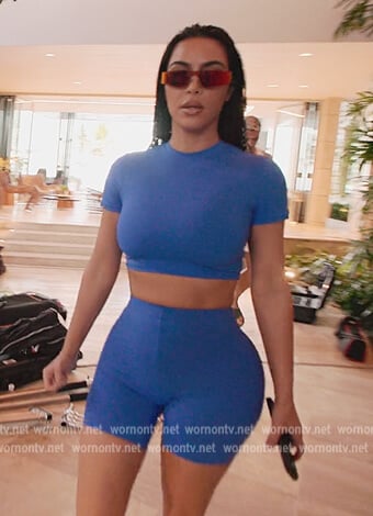 Kim's blue swim shorts on The Kardashians