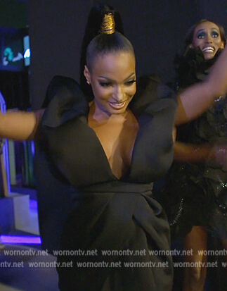 Lesa's black ruffle shoulder mini dress on The Real Housewives of Dubai