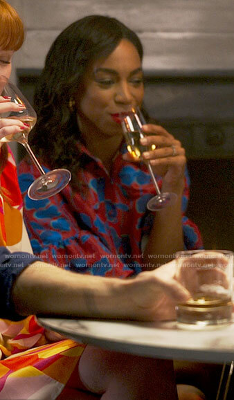 Livia's red and blue floral dress on Chloe