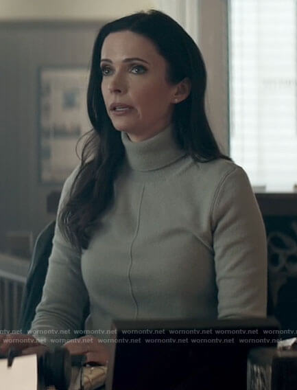 Lois's light blue turtleneck sweater on Superman and Lois