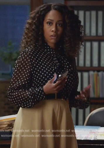 Lola's black polka dot tie neck blouse on All Rise