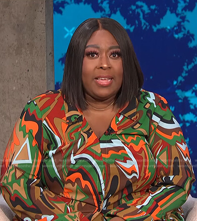 Loni's abstract print blouse and pants on E! News Daily Pop