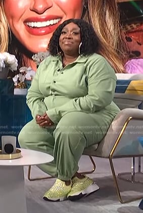 Loni's sage green jumpsuit on E! News Daily Pop