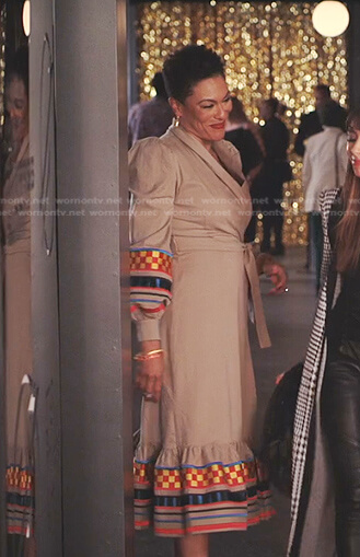 Lorraine’s beige embroidered wrap dress on Tom Swift