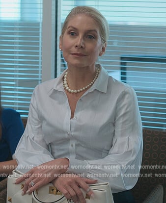 Margot's white rose print blouse on First Kill