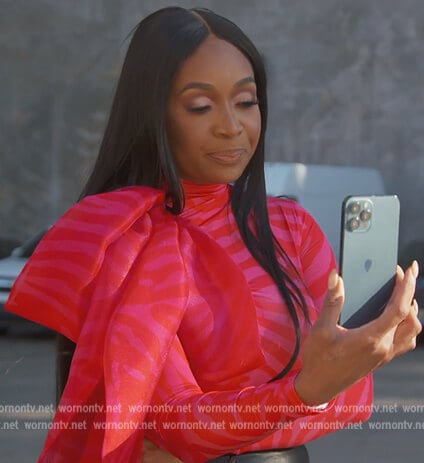 Marlo's pink tiger stripe catsuit on The Real Housewives of Atlanta