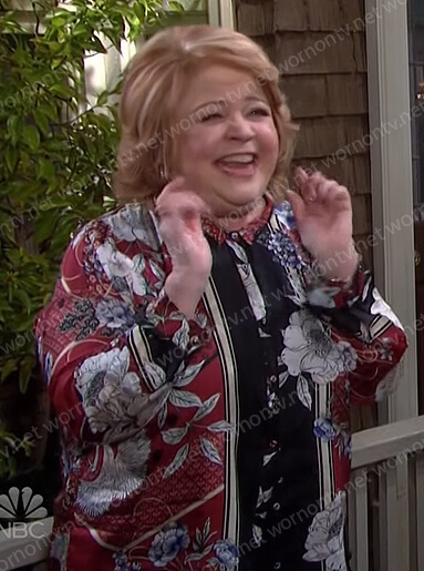 Nancy's red and black floral print blouse on Days of our Lives