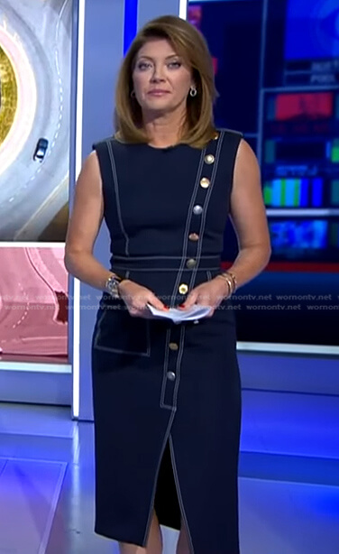 Norah's black asymmetric button dress on CBS Evening News