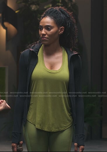 Talia's green tank and leggings on First Kill