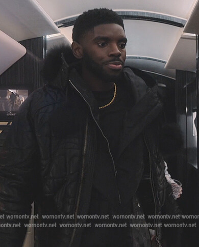 Tom's black quilted jacket on Tom Swift