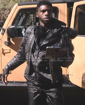 Tom's black nylon jacket and pants on Tom Swift