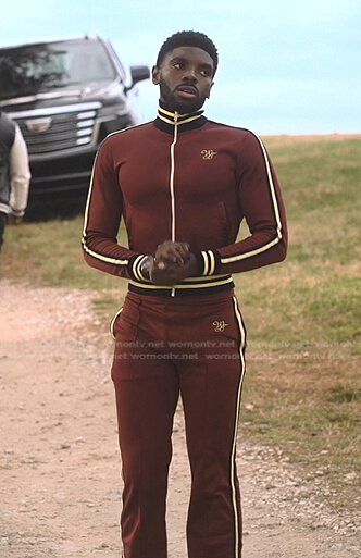 Tom's red striped trim track jacket and pants on Tom Swift