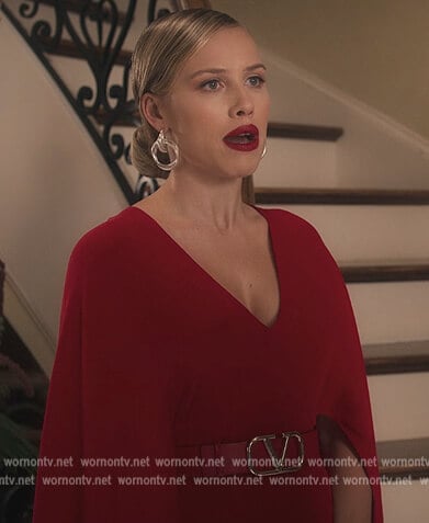 Elinor's red cape dress and belt on First Kill