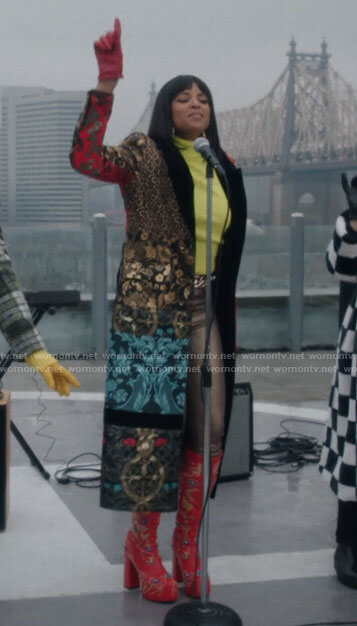 Wickie's long patchwork coat and embellished red boots on Girls5eva