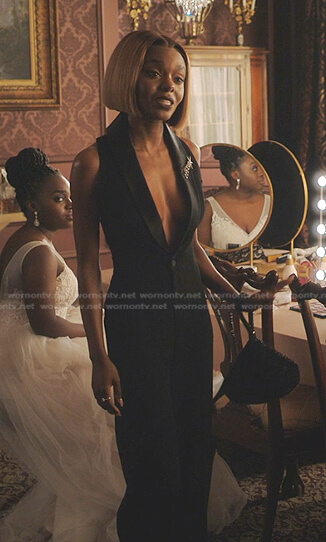 Zenzi’s black sleeveless tuxedo jumpsuit on Tom Swift