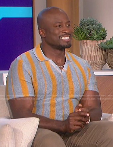 Akbar's grey and orange striped polo shirt on The Talk