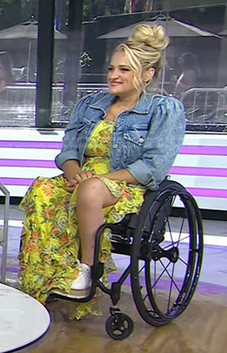 Ali Stroker's yellow floral dress and denim jacket on Today