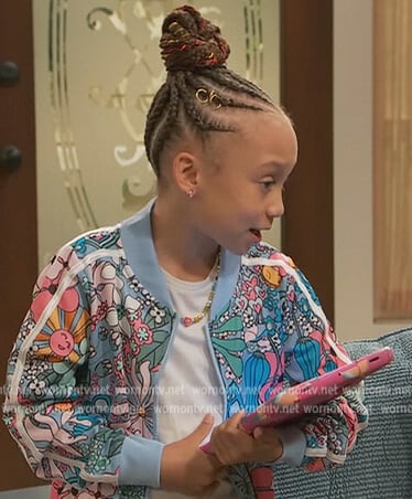 Alice's blue floral jacket on Ravens Home