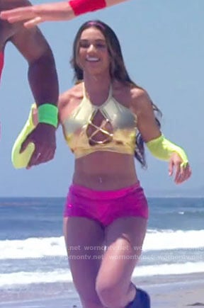 Courtney's gold crop top and pink booty shorts on Love Island USA