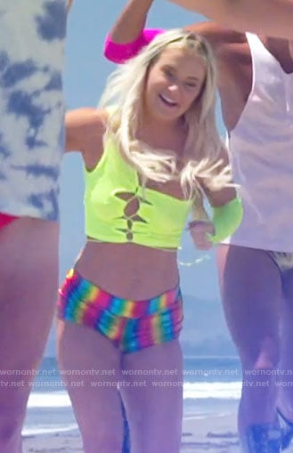 Deb's neon green top and rainbow booty shorts on Love Island USA