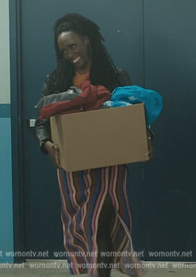 Deja's stripe skirt and yellow creature print tee on The Chi
