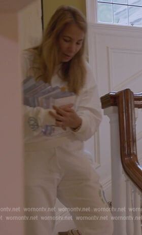 Jill's white printed sweatshirt and pants on The Real Housewives Ultimate Girls Trip