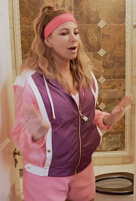 Jill's purple colorblock jacket on The Real Housewives Ultimate Girls Trip