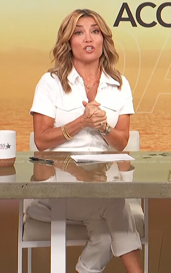 Kit's white zip jumpsuit on Access Hollywood