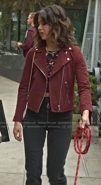Louise's butterfly print top and red suede jacket on Maggie