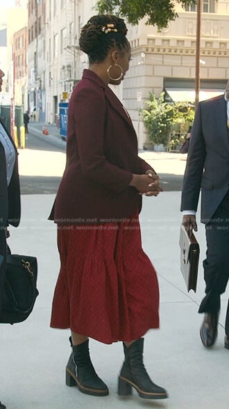Malika's red dress and boots on Good Trouble