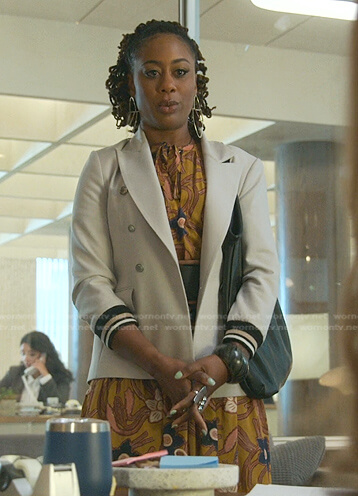 Malika's yellow floral tie neck dress on Good Trouble