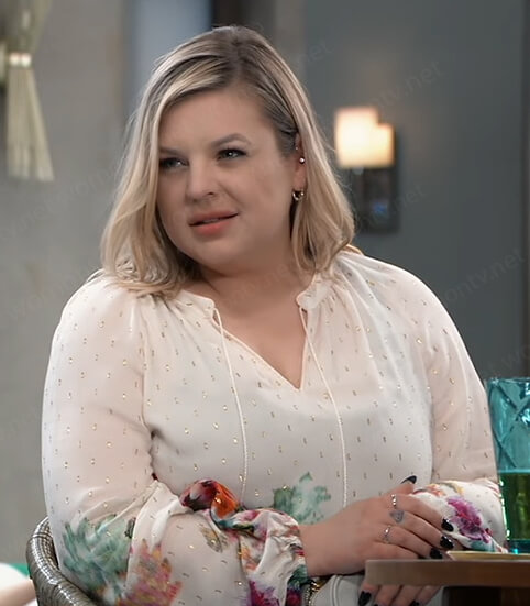 Maxie's white floral metallic blouse on General Hospital