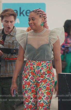 Phoebe's green mesh ruffle top and floral pants on Everythings Trash