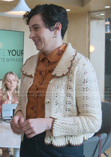Rachel’s orange fox print blouse and cardigan on Good Trouble