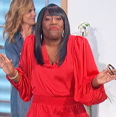 Sheryl's red smocked waist top on The Talk