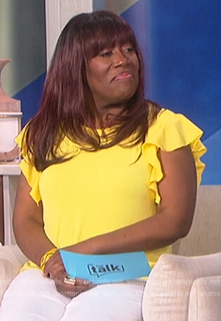 Sheryl's yellow ruffle top on The Talk